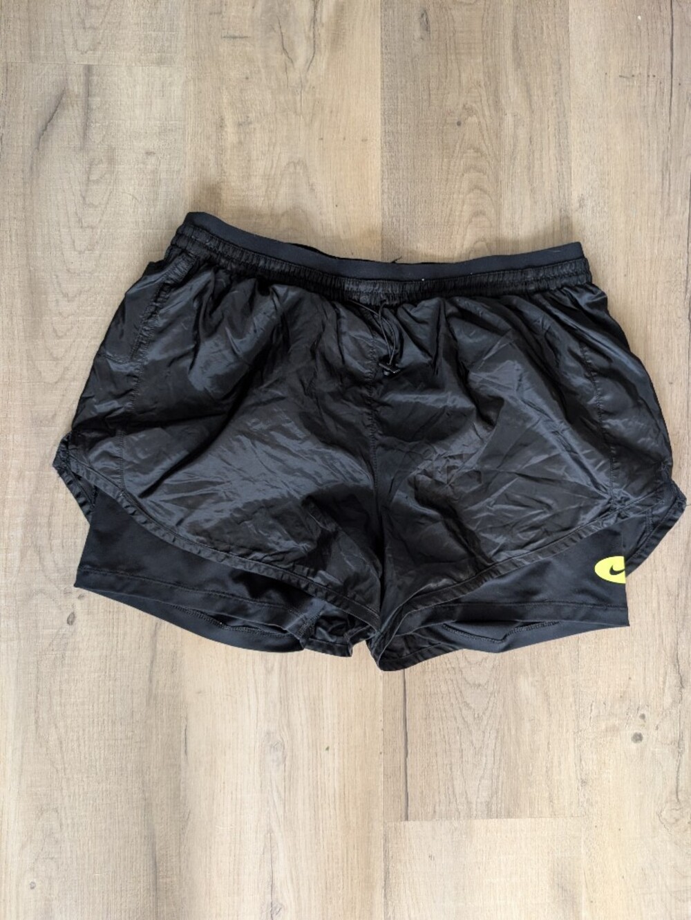 Nike Black Athletic Shorts with Yellow Swoosh